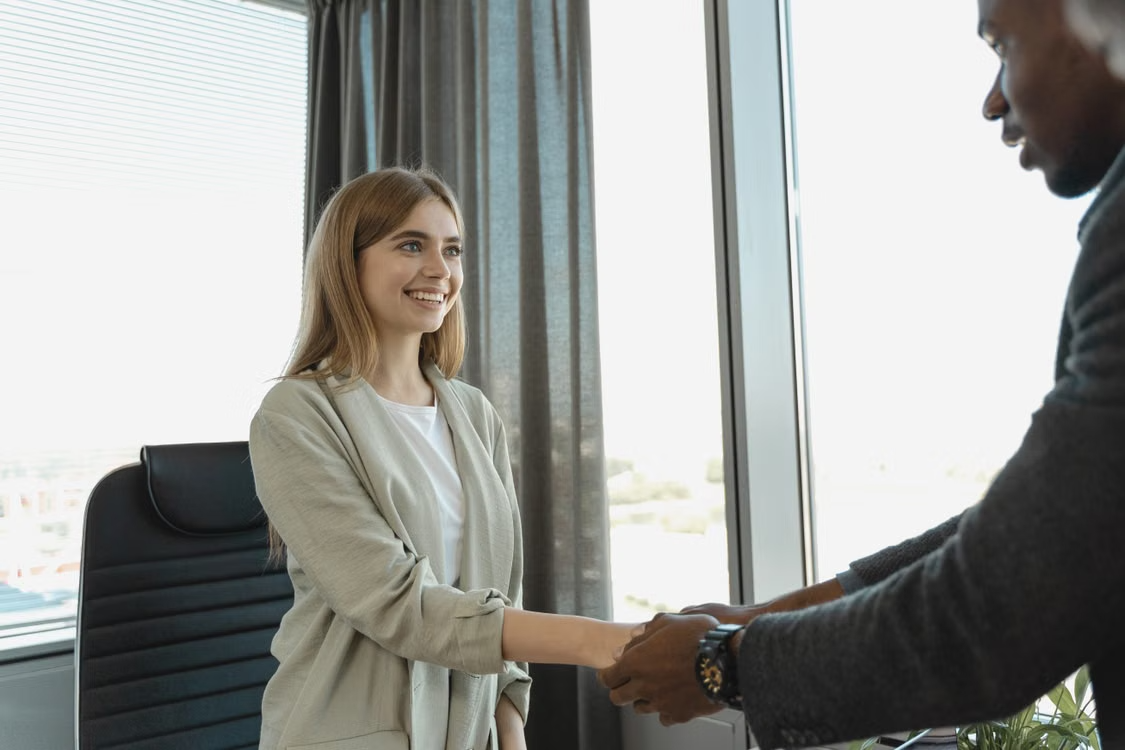 A hiring manager welcoming a new team member